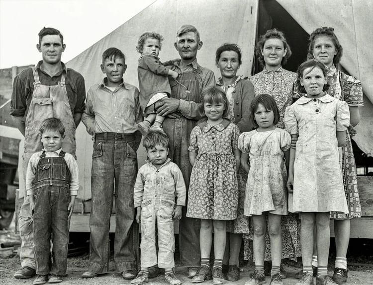 image  1 Migrant farm worker with his wife and ten children, originally from Oklahoma where he had been tenan